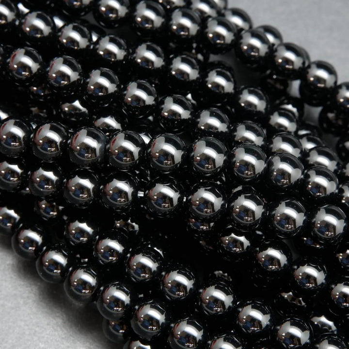 Black onyx round loose beads.