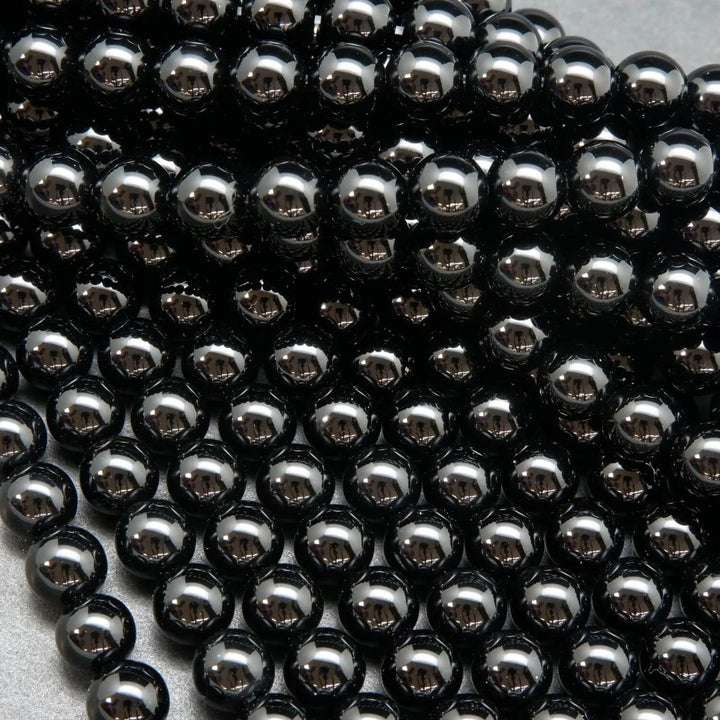 Black onyx round loose beads.