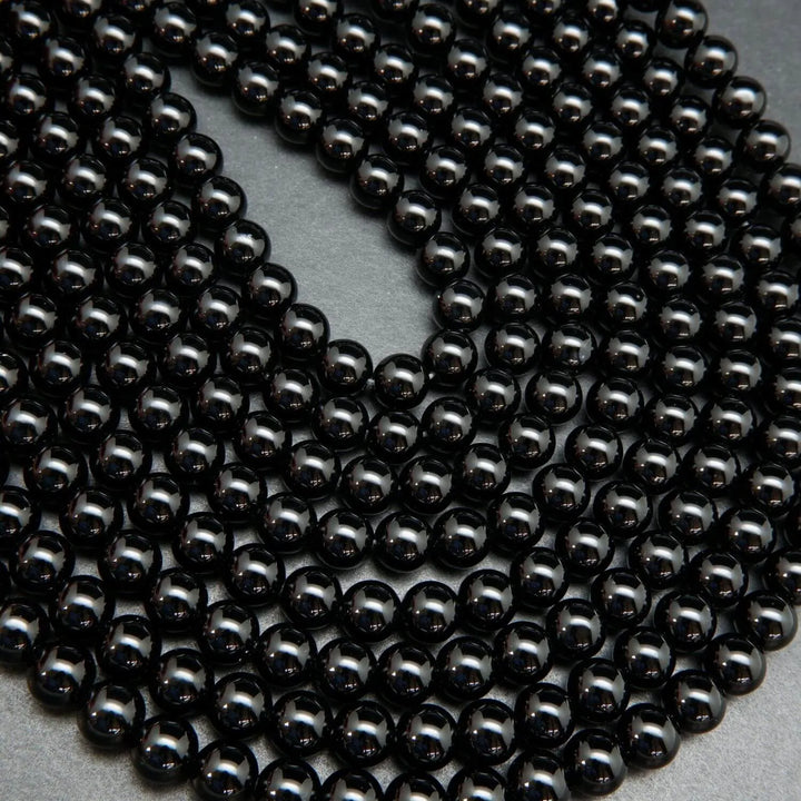 Black onyx round loose beads.