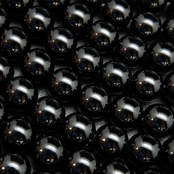 Black onyx round loose beads.