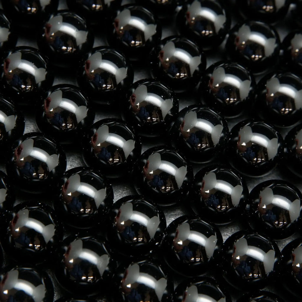 Black onyx round loose beads.