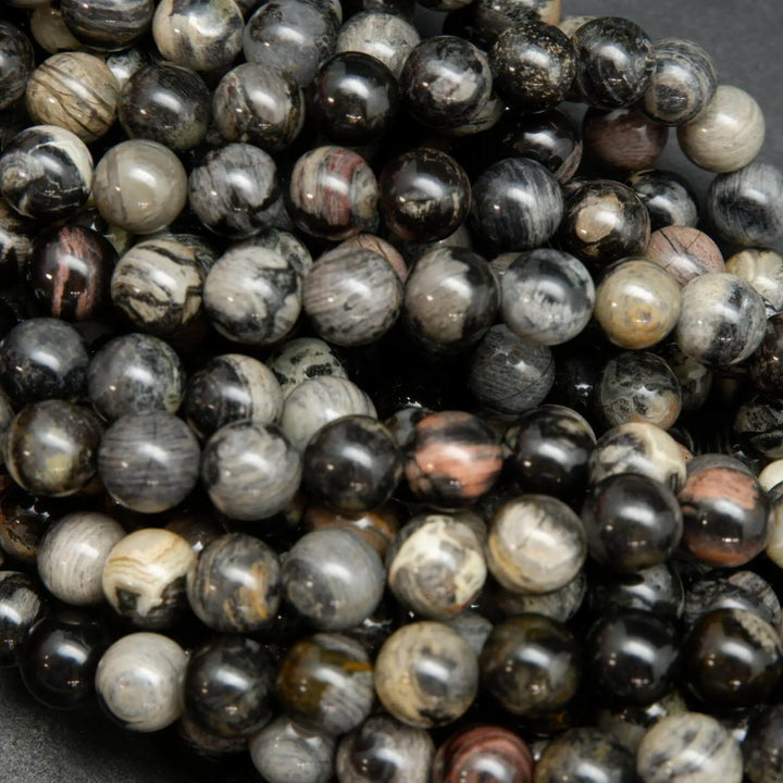 Black silver leaf jasper smooth polished round beads.