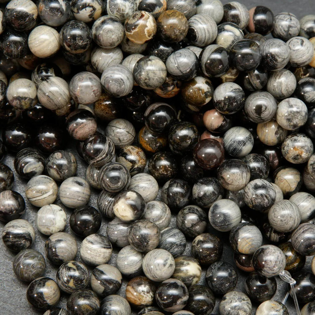 Black silver leaf jasper smooth polished round beads.