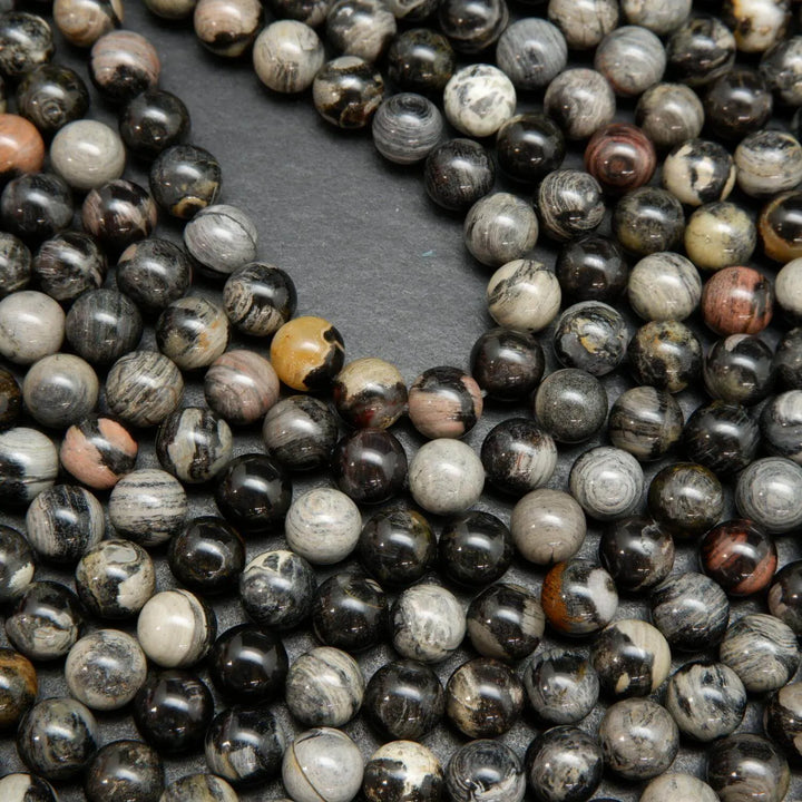 Black silver leaf jasper smooth polished round beads.