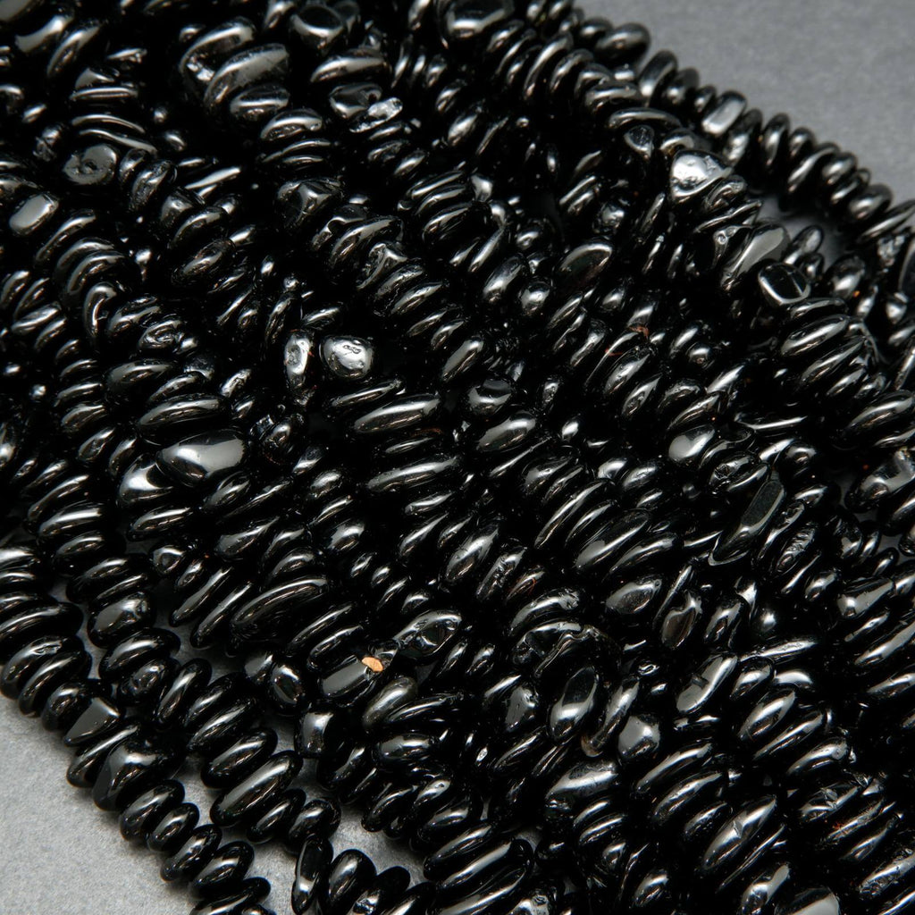 Polished black tourmaline chip beads.