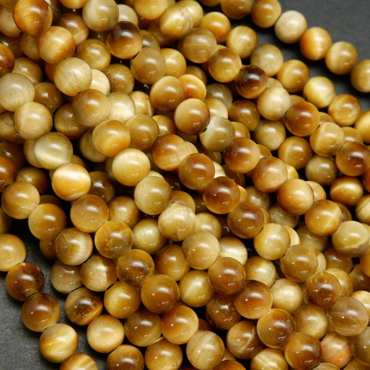 Large hole yellow blonde tiger's eye beads.
