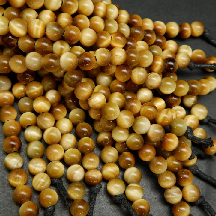 Large hole yellow blonde tiger's eye beads.