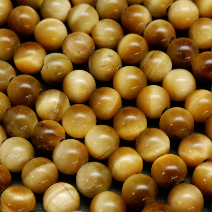 Large hole yellow blonde tiger's eye beads.
