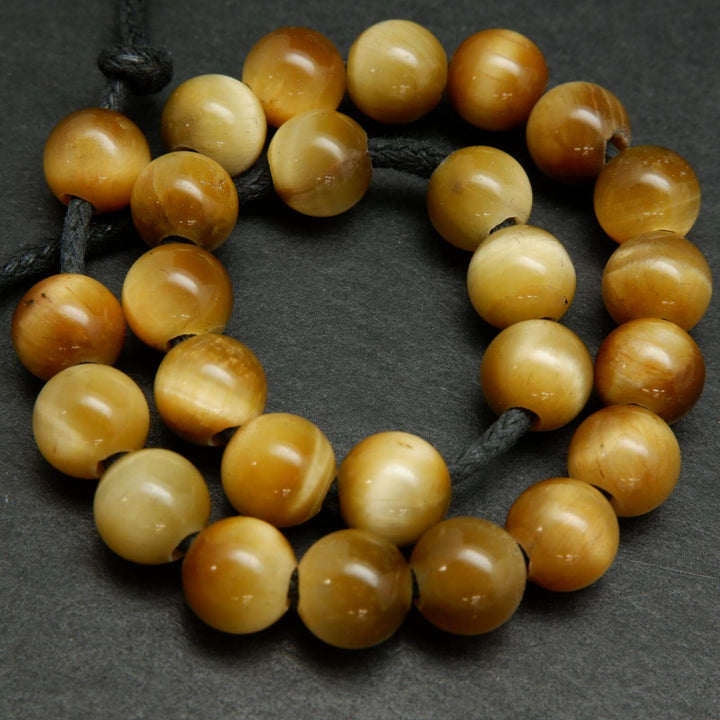 Large hole yellow blonde tiger's eye beads.
