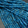 Blue apatite rondelle beads.