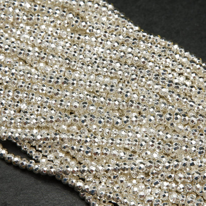 Faceted rondelle hematite beads.