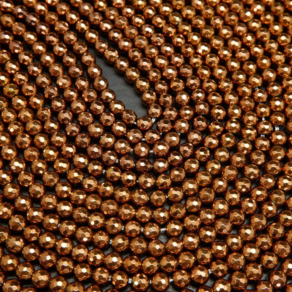 Faceted bronze hematite beads.