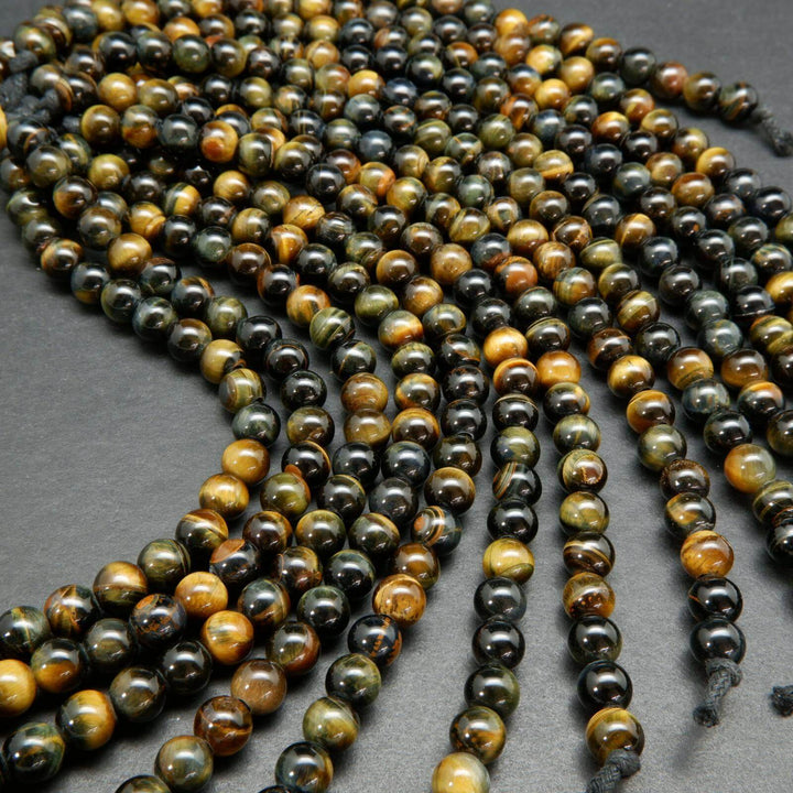 Bluish brown tiger's eye large hole beads.