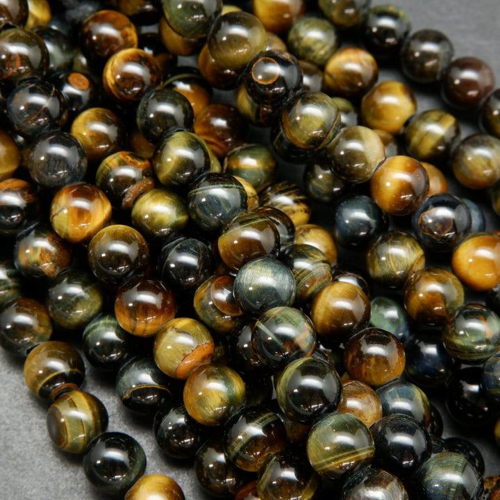 Bluish brown tiger's eye large hole beads.