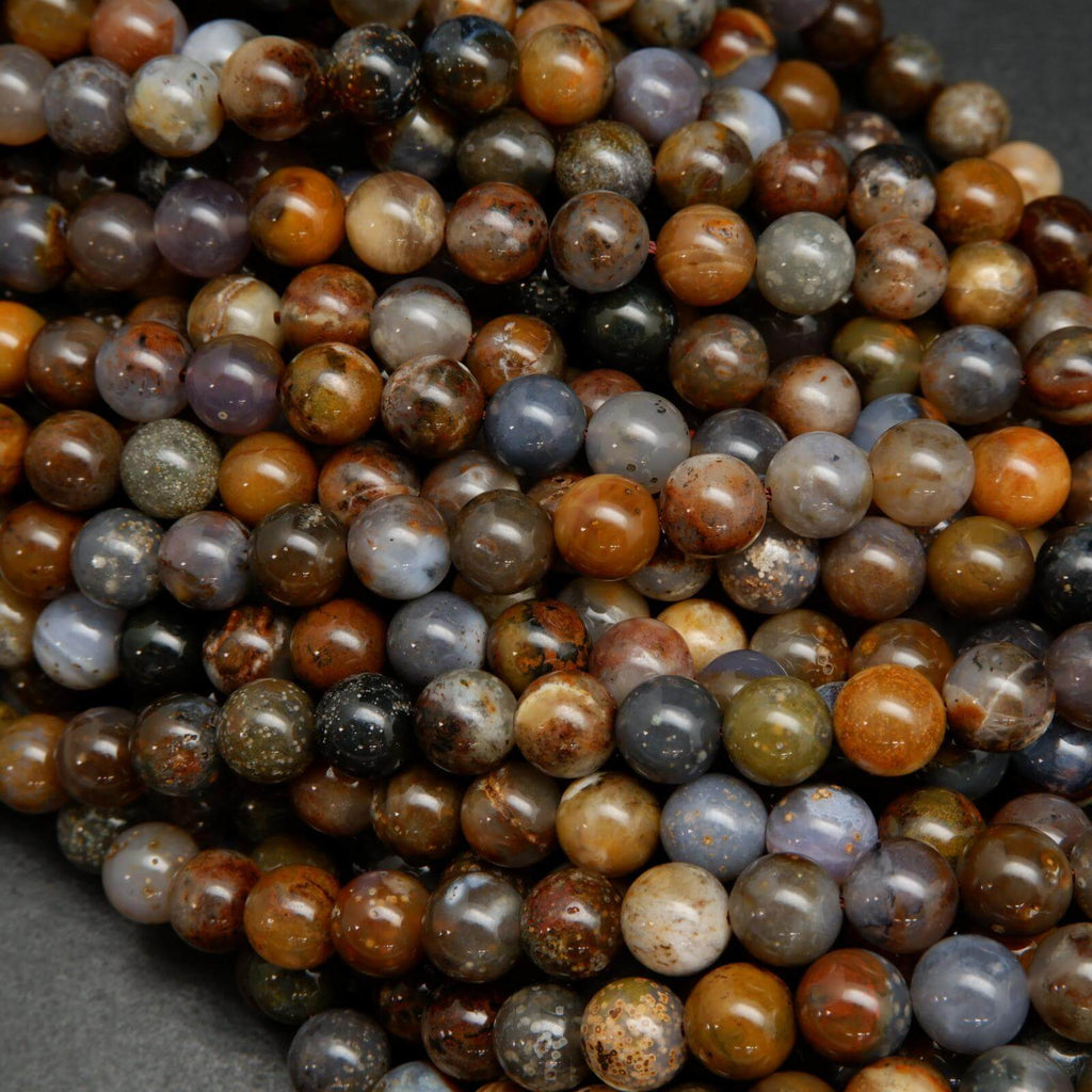 Brown dendritic opal beads.