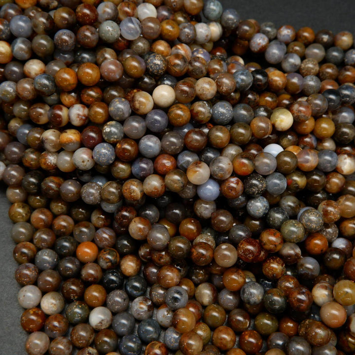 Brown dendritic opal beads.