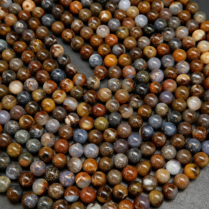 Brown dendritic opal beads.
