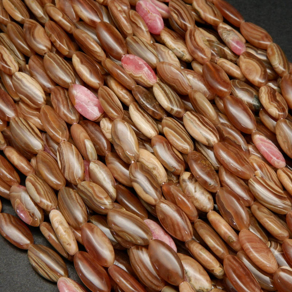 Brown oval shape rhodochrosite beads.