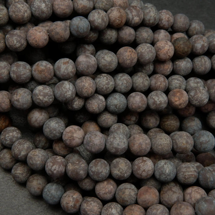 Matte finish brown snowflake obsidian beads.