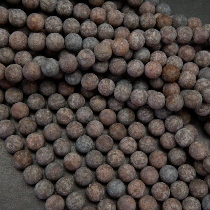 Matte finish brown snowflake obsidian beads.