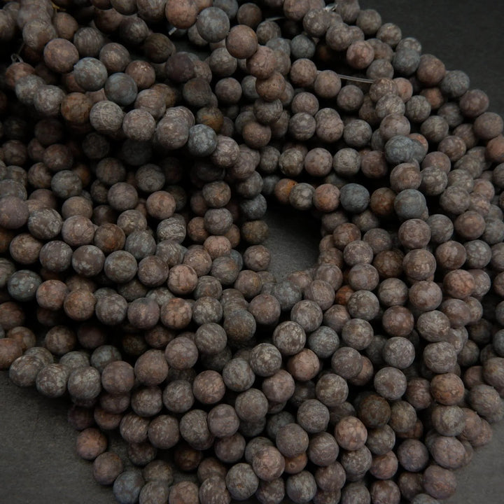 Matte finish brown snowflake obsidian beads.