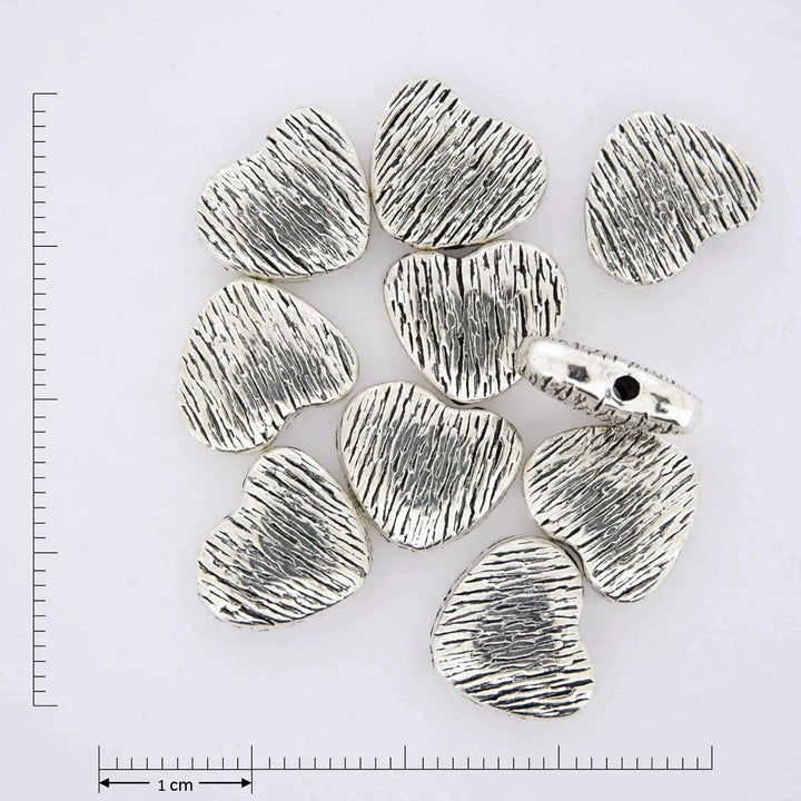Brushed heart silver jewelry findings.