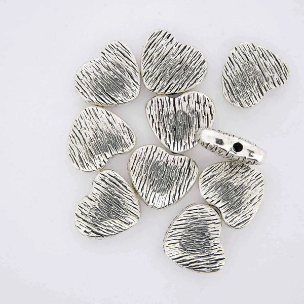 Brushed heart silver jewelry findings.