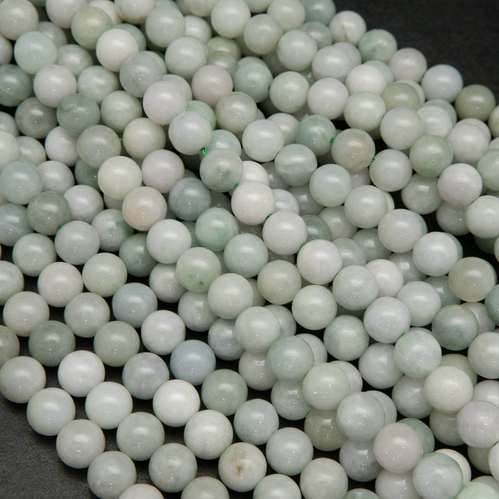 Green and white Burmese jade beads.