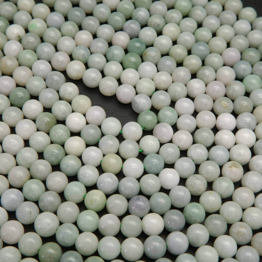 Green and white Burmese jade beads.