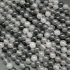 Grey cloudy quartz beads.