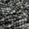 Grey cloudy quartz beads.