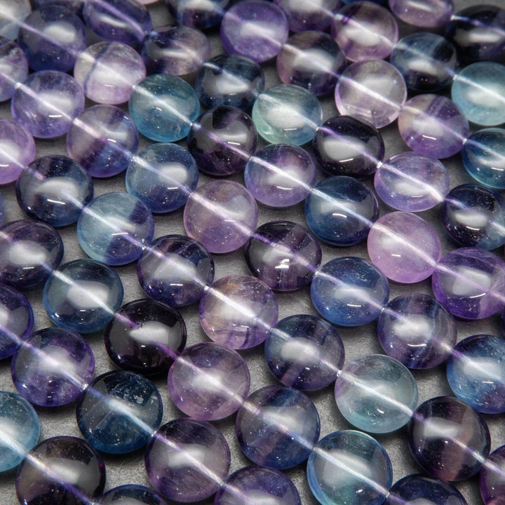 Multicolor fluorite coin shape beads.