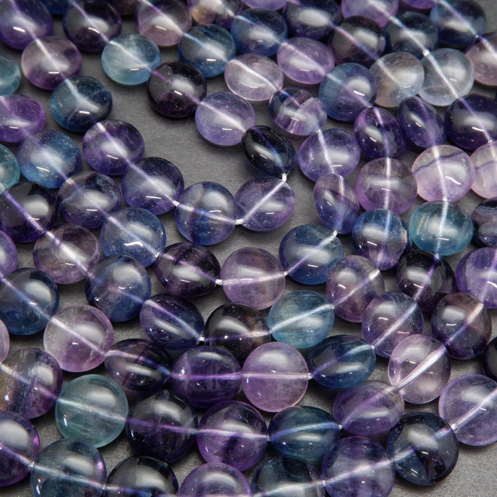 Multicolor fluorite coin shape beads.