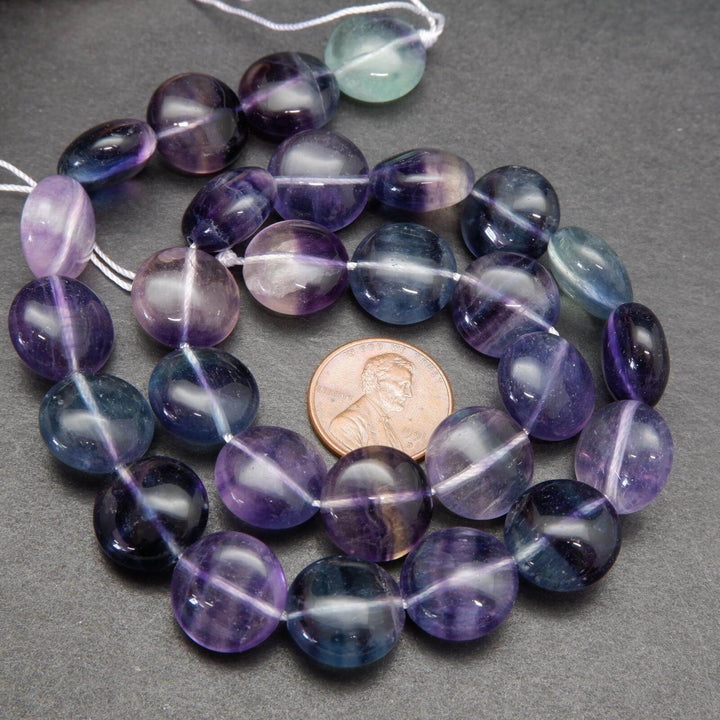 Multicolor fluorite coin shape beads.
