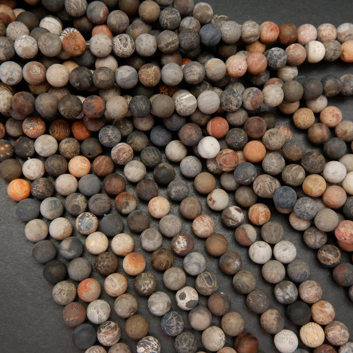 multicolor fossil coral beads with flowerlike patterns.
