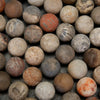 multicolor fossil coral beads with flowerlike patterns.