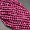 Natural ruby beads. Faceted round loose beads.