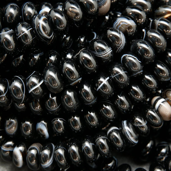 High polish finish smooth rondelle shape sardonyx agate beads.