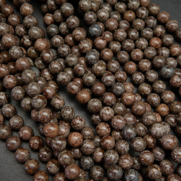 Brown snowflake obsidian beads.
