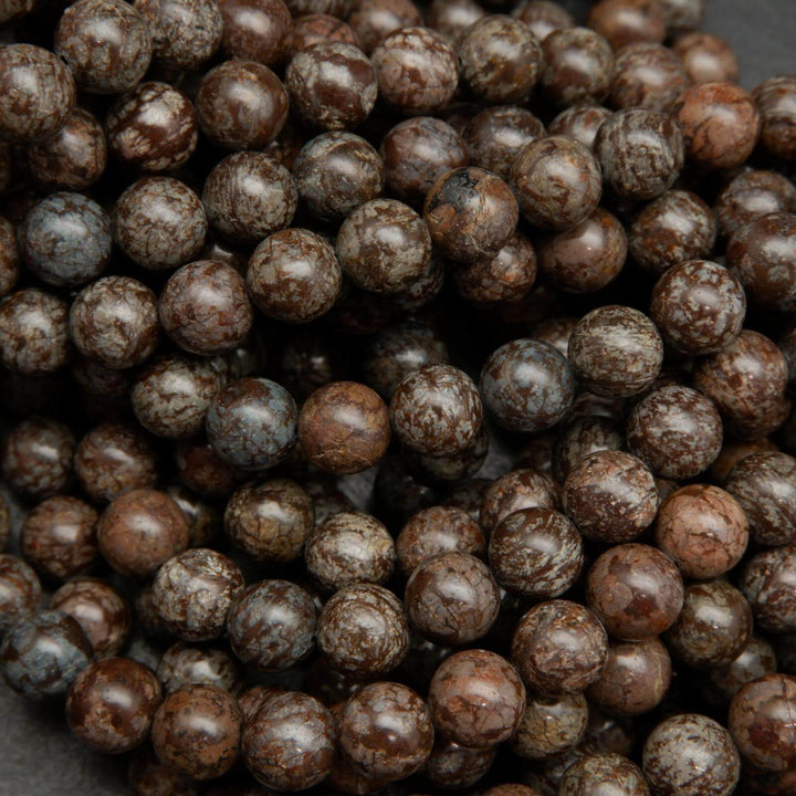Brown snowflake obsidian beads.