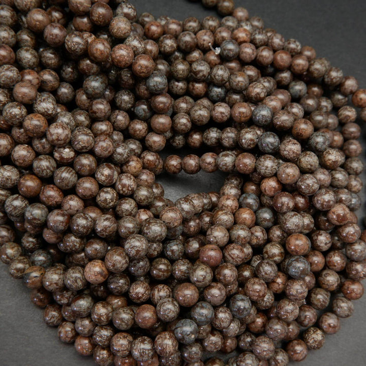 Brown snowflake obsidian beads.