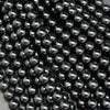Polished Black Tourmaline Beads.