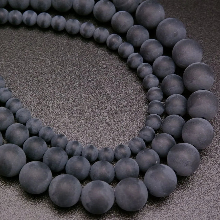 Matte finish black onyx beads.