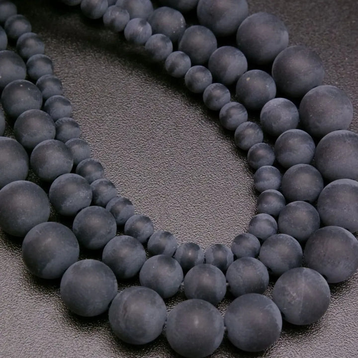 Matte finish black onyx beads.
