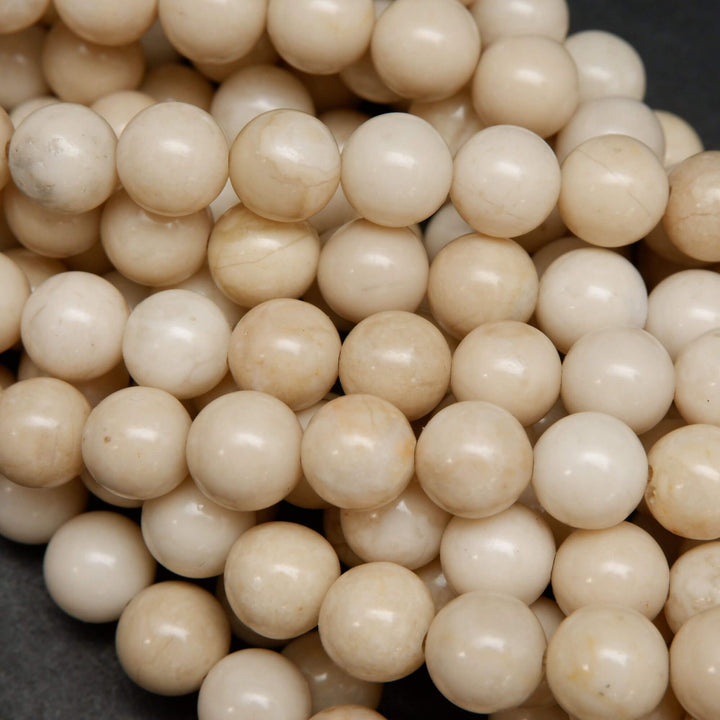 Beige color fossil jasper beads.