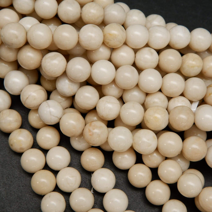 Beige color fossil jasper beads.