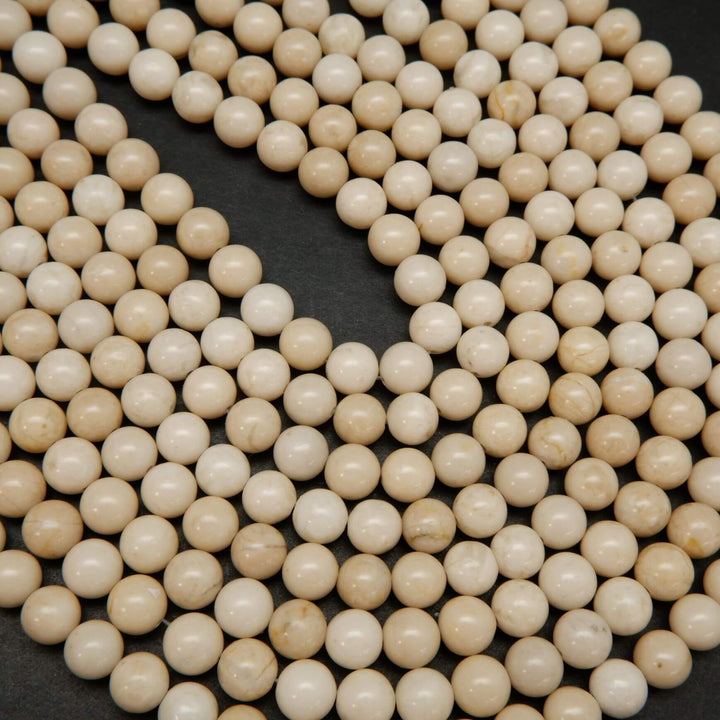 Beige color fossil jasper beads.