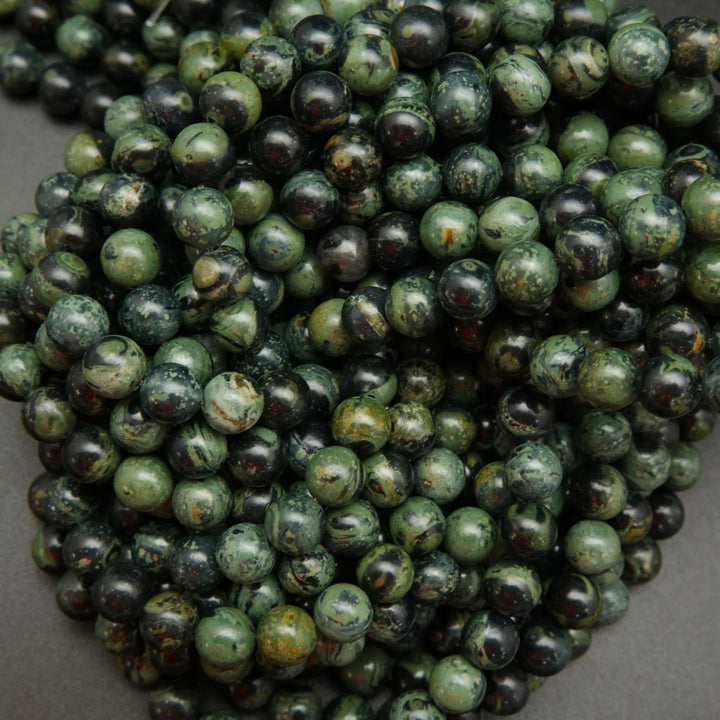 Green and black kambaba jasper beads.