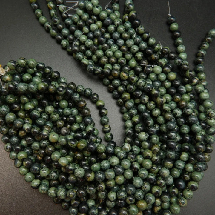 Green and black kambaba jasper beads.