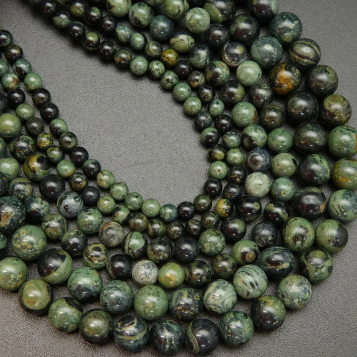 Green and black kambaba jasper beads.